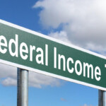 Federal Income Tax Free Of Charge Creative Commons Green Highway Sign