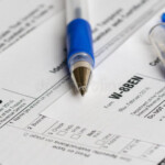 Tax Reporting Forms With Opened Blue Pen Editorial Stock Image Image